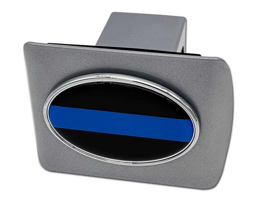 Metallic hitch cover with thin blue line design on a white background