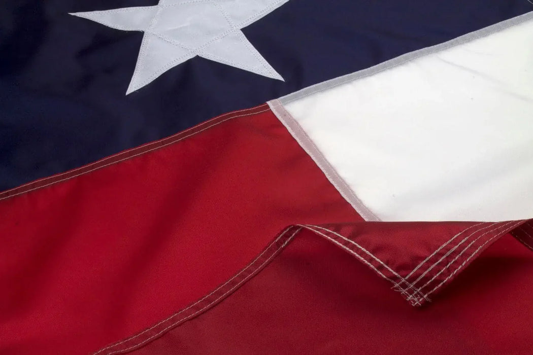Close-up of Texas flag canvas heading and brass grommets