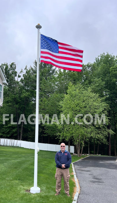 Fiberglass flagpole with an American flag and solar light in Connecticut