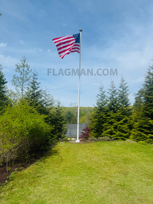 solar light on a fiberglass flagpole with an American Flag flying