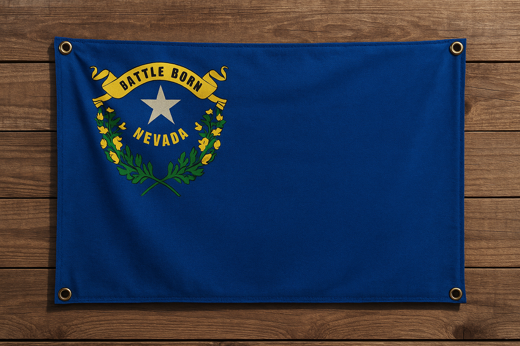 Realistic Nevada flag with a brass grommet in each corner mounted to a wood wall